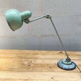 Old green industrial desk lamp