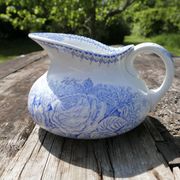 Iron earth pitcher
