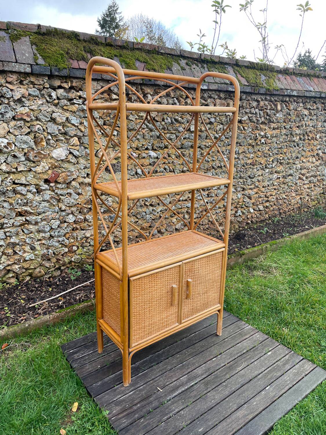 Honey-colored rattan shelf 🍯