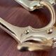 4 golden brass coat racks