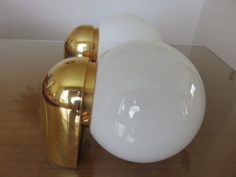 Pair of appliques " Limburg " white opaline and golden methacrylate 80s