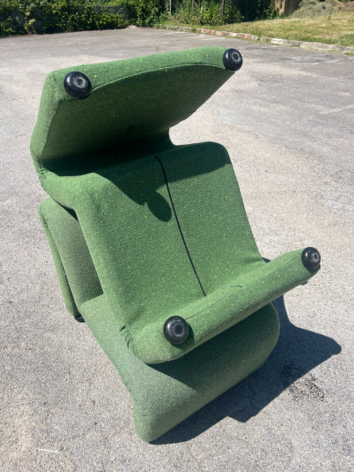 Green armchairs designed by Étienne Fermigier