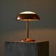 Art Deco table lamp in patinated copper, brass, and satin glass from the 1950s.