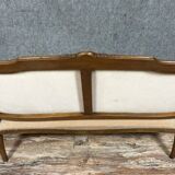 Louis XV style bench in molded and carved wood circa 1900