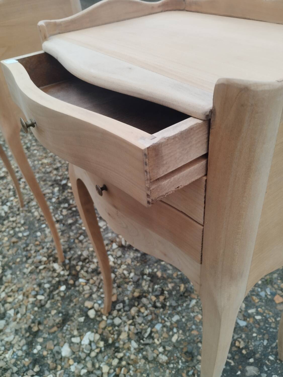 Pair of antique wooden bedside tables in Louis XV style.