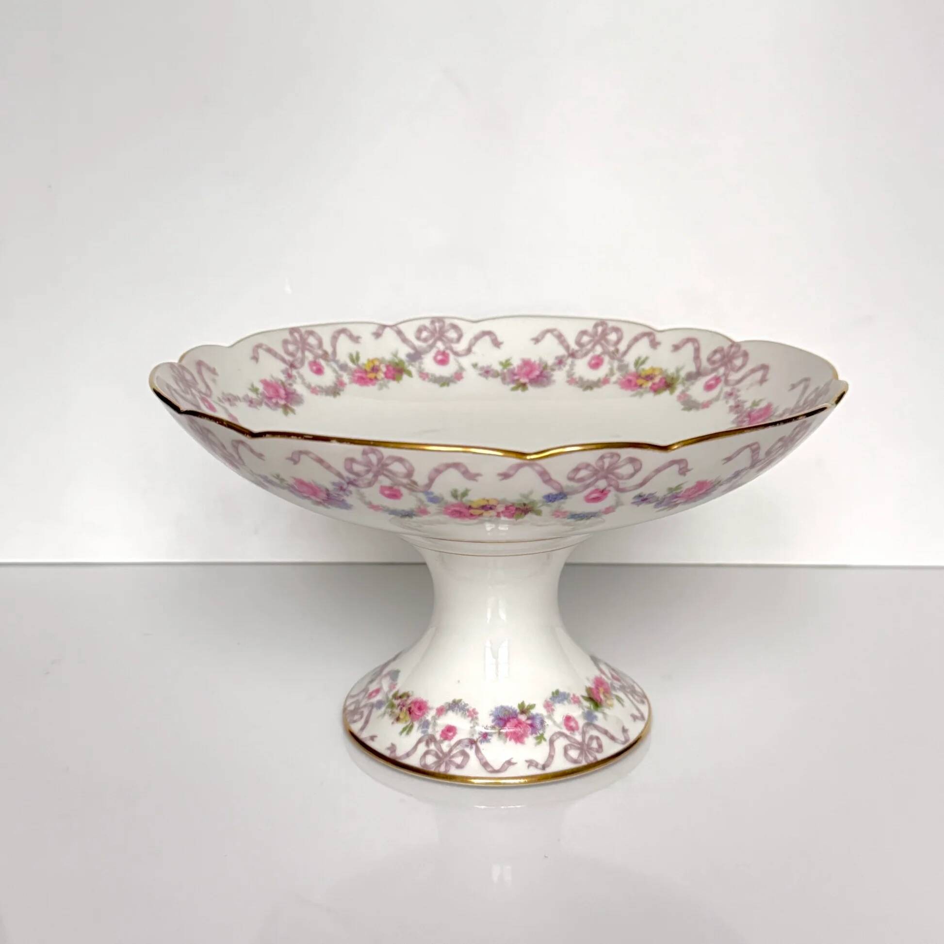 Compote dish on pedestal / fruit bowl in Limoges porcelain with floral garlands and ribbons | “Vieux Bernardaud” D&C (Delinières & Cie) | late 19th century