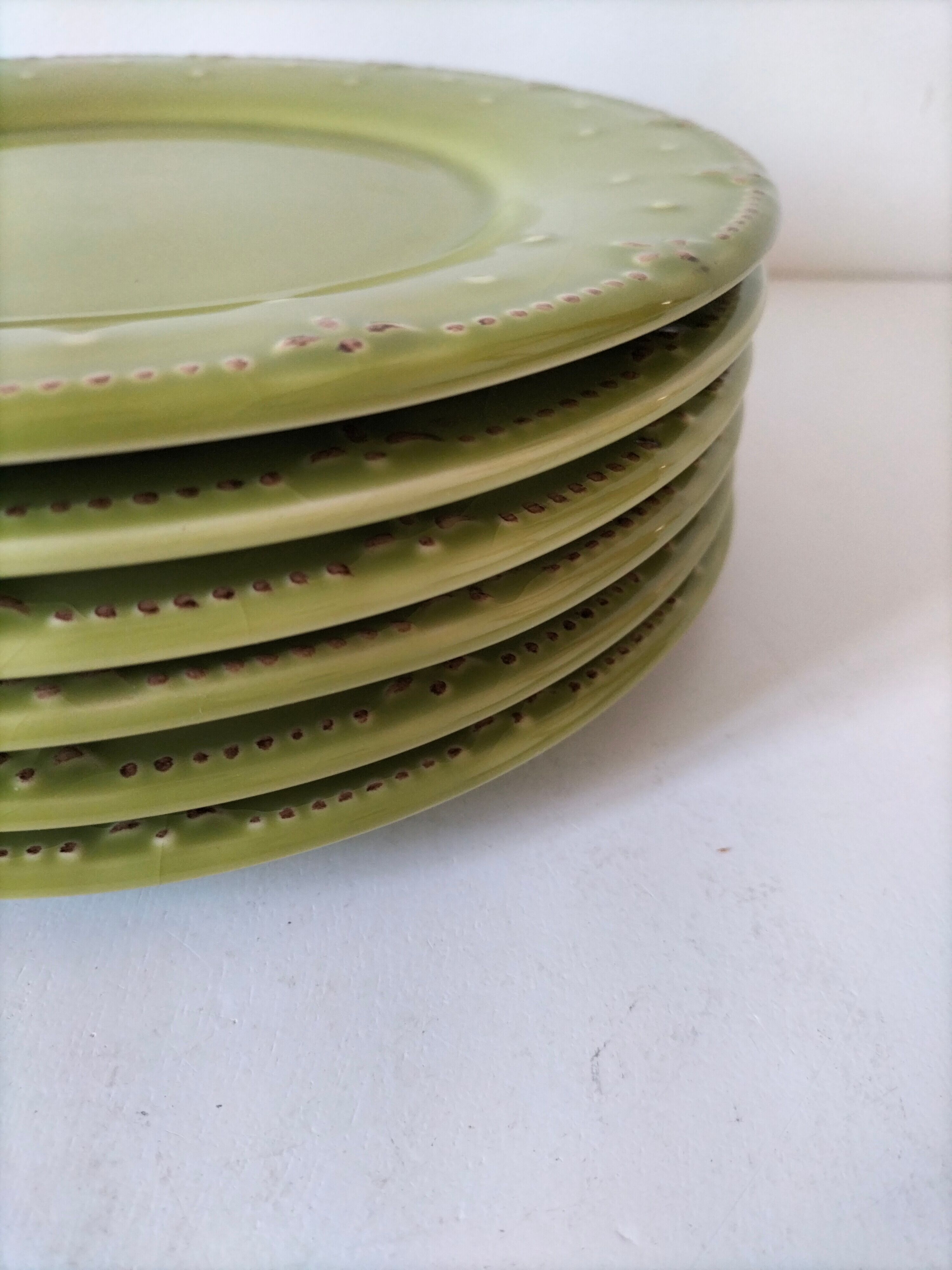6 olive green plates with dotted relief, workshop ceramic style
