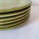 6 olive green plates with dotted relief, workshop ceramic style