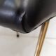 Footrest / stool 1960s with tapered gold legs & faux leather seat