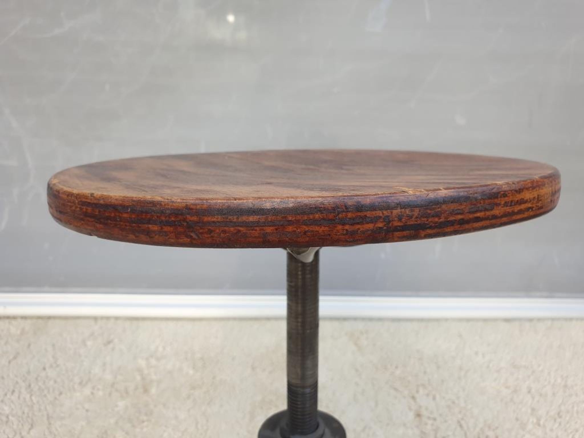 Bienaise stool of the years 1935, model 203 with 4 flat iron cathedral legs joined by a