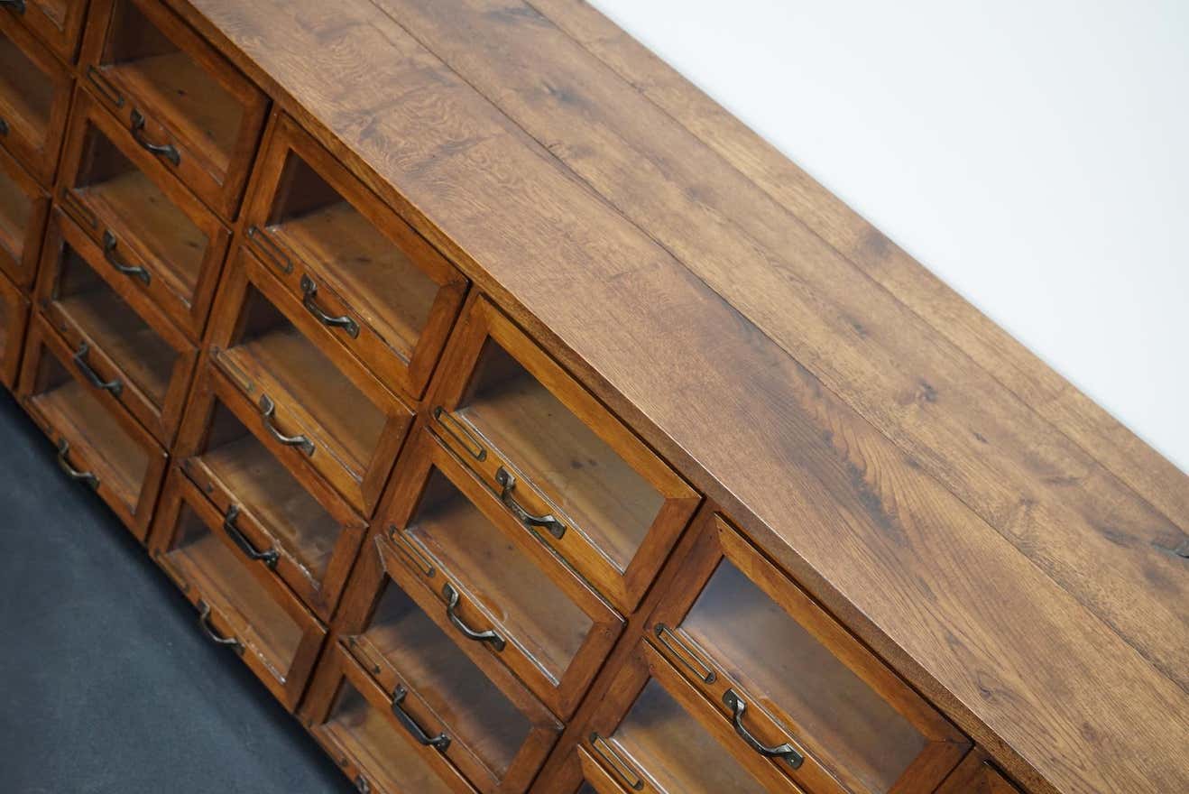 Vintage dutch oak haberdashery cabinet 1930s