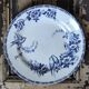 Set of four flat plates in iron earth