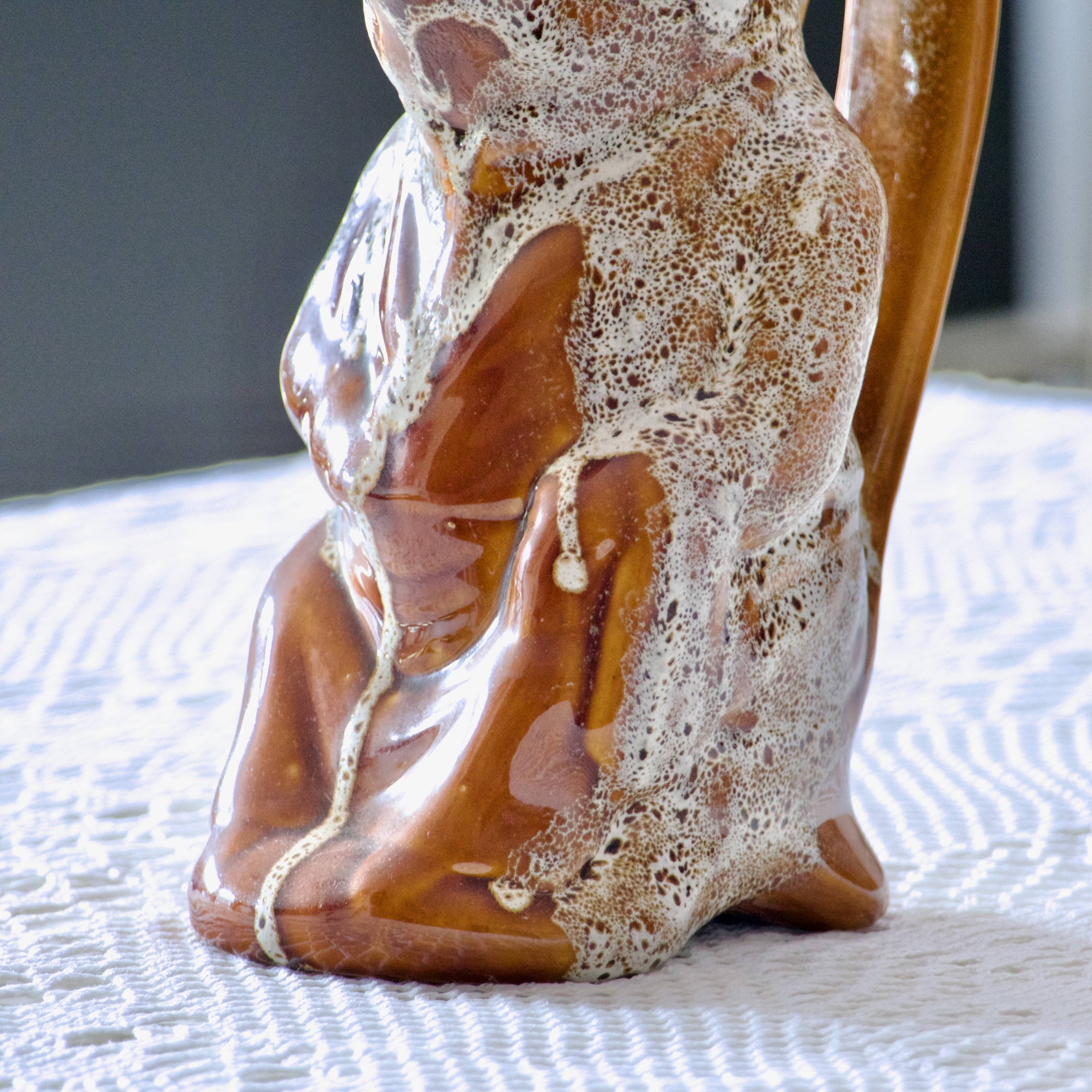 Antique zoomorphic pig carafe in foam-enameled stoneware