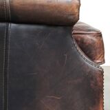 Fauteuil à oreilles en cuir de vache de style anglais avec des couleurs uniques et un excellent confort