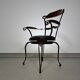 Italian postmodern turnable wrought iron dining chairs with leather seats