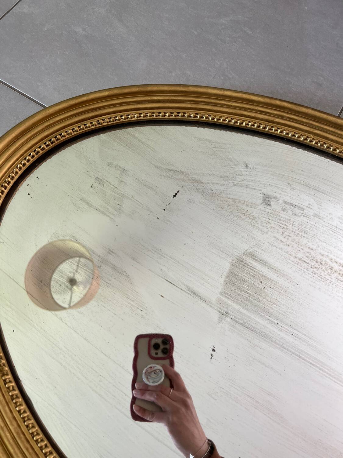 Vintage oval gold mirror