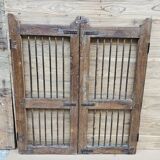 Old gate in Burmese teak and wrought iron
