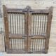 Old gate in Burmese teak and wrought iron