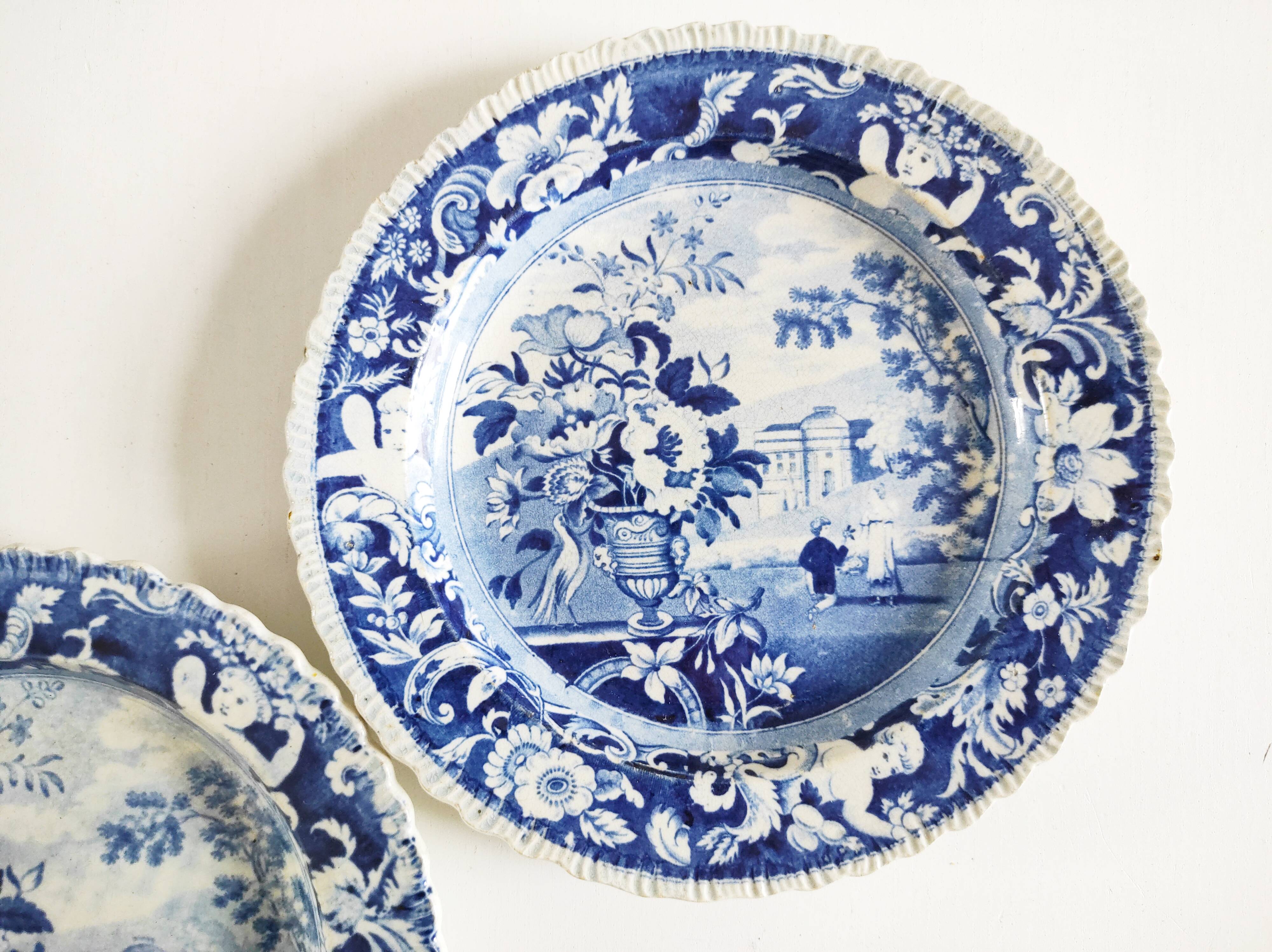 Five 19th century Calais earthenware plates with a romantic gallant couple decor