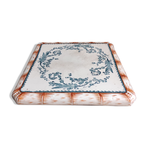 Trivet antique en porcelaine