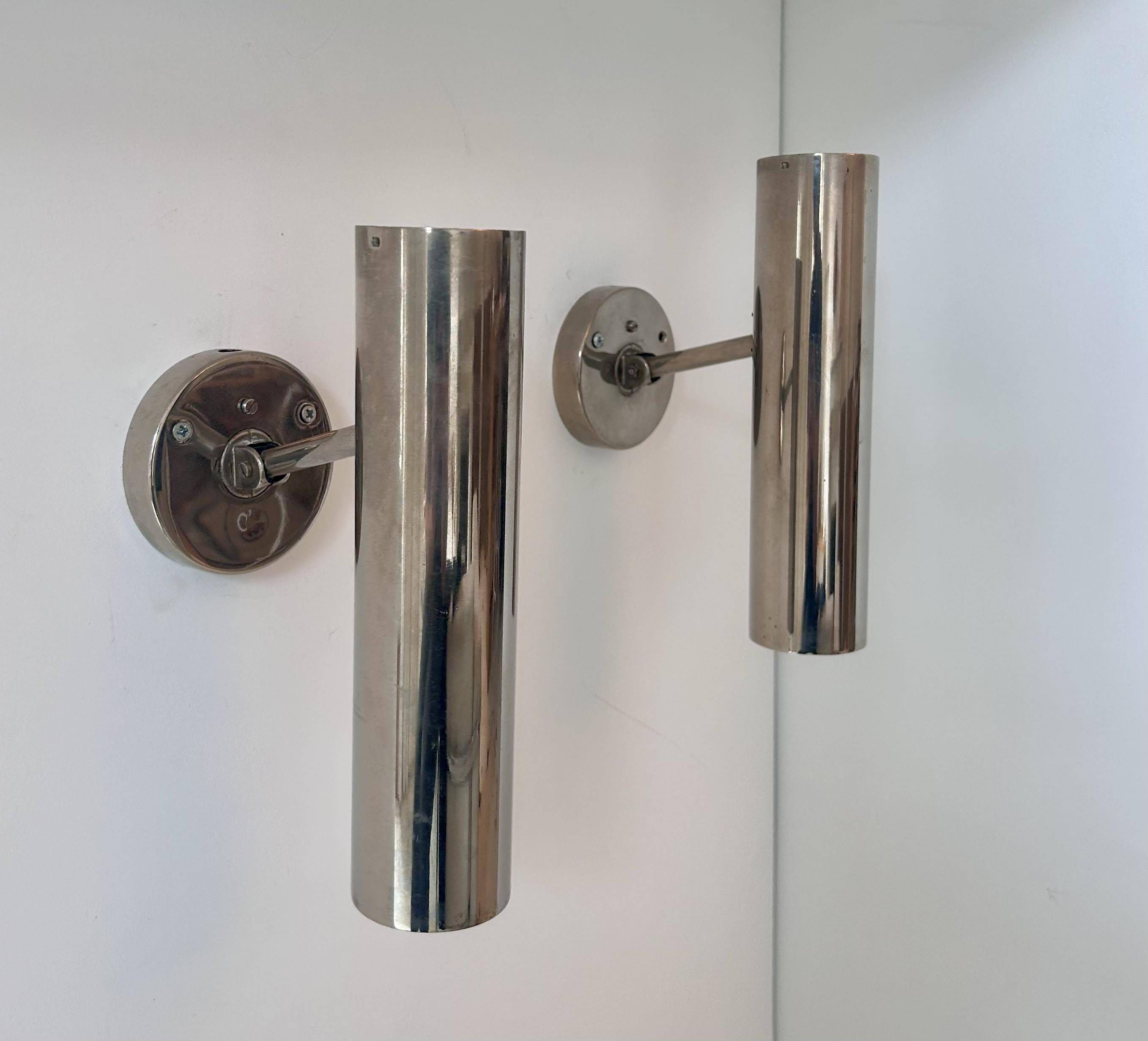 Pair of modernist adjustable wall lights, chrome metal, France 1960
