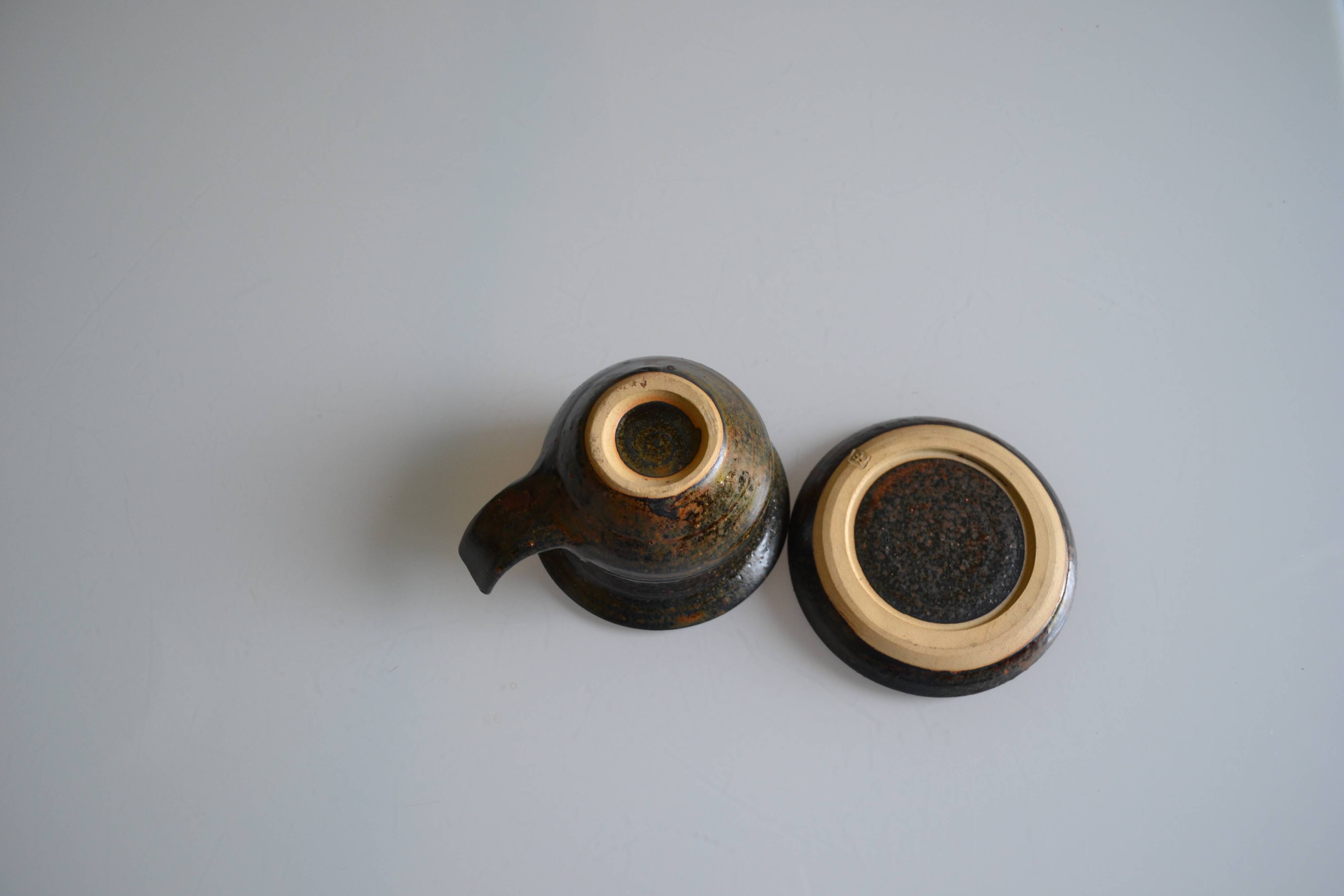 1970s ceramic cup and saucer signed