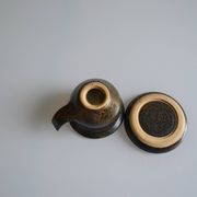 1970s ceramic cup and saucer signed