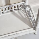 White woven wicker shelf