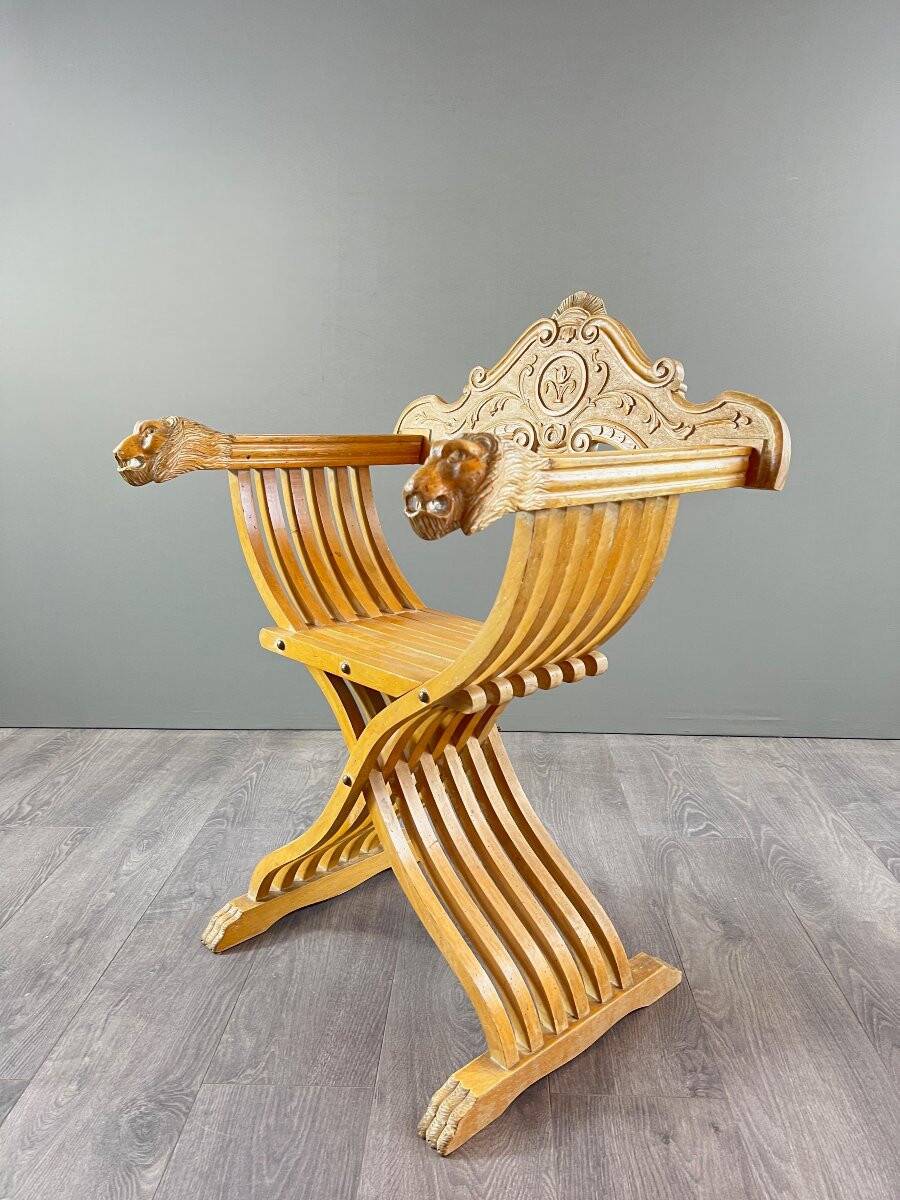 Pair of Renaissance-style folding armchairs, early 20th century