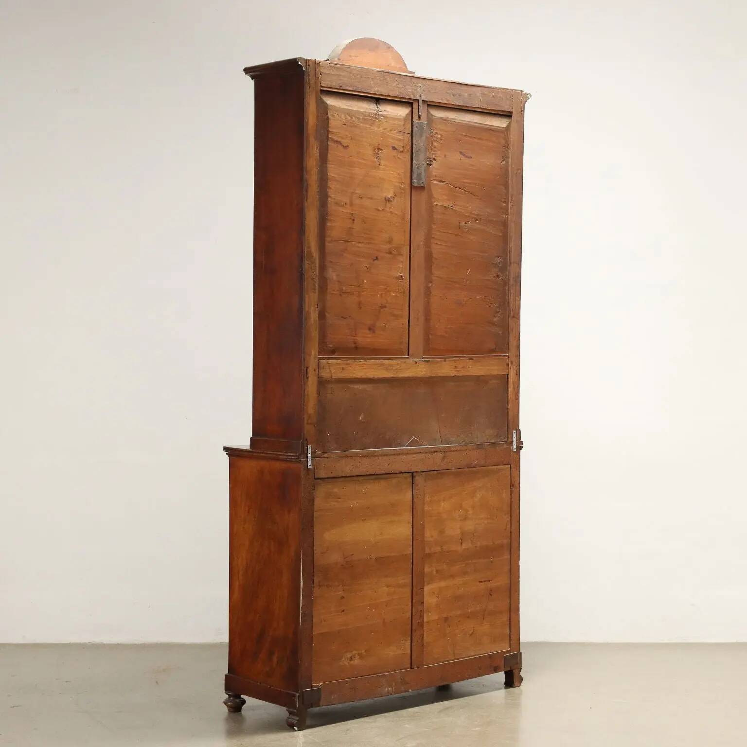 Antique double-bodied display cabinet with walnut drawers, Italy, 20th century.