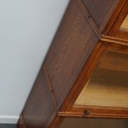 German oak bookcase with folding doors, ca 1900