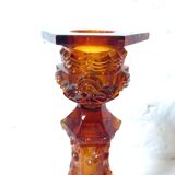 Pair of amber glass torches decorated with gothic motifs