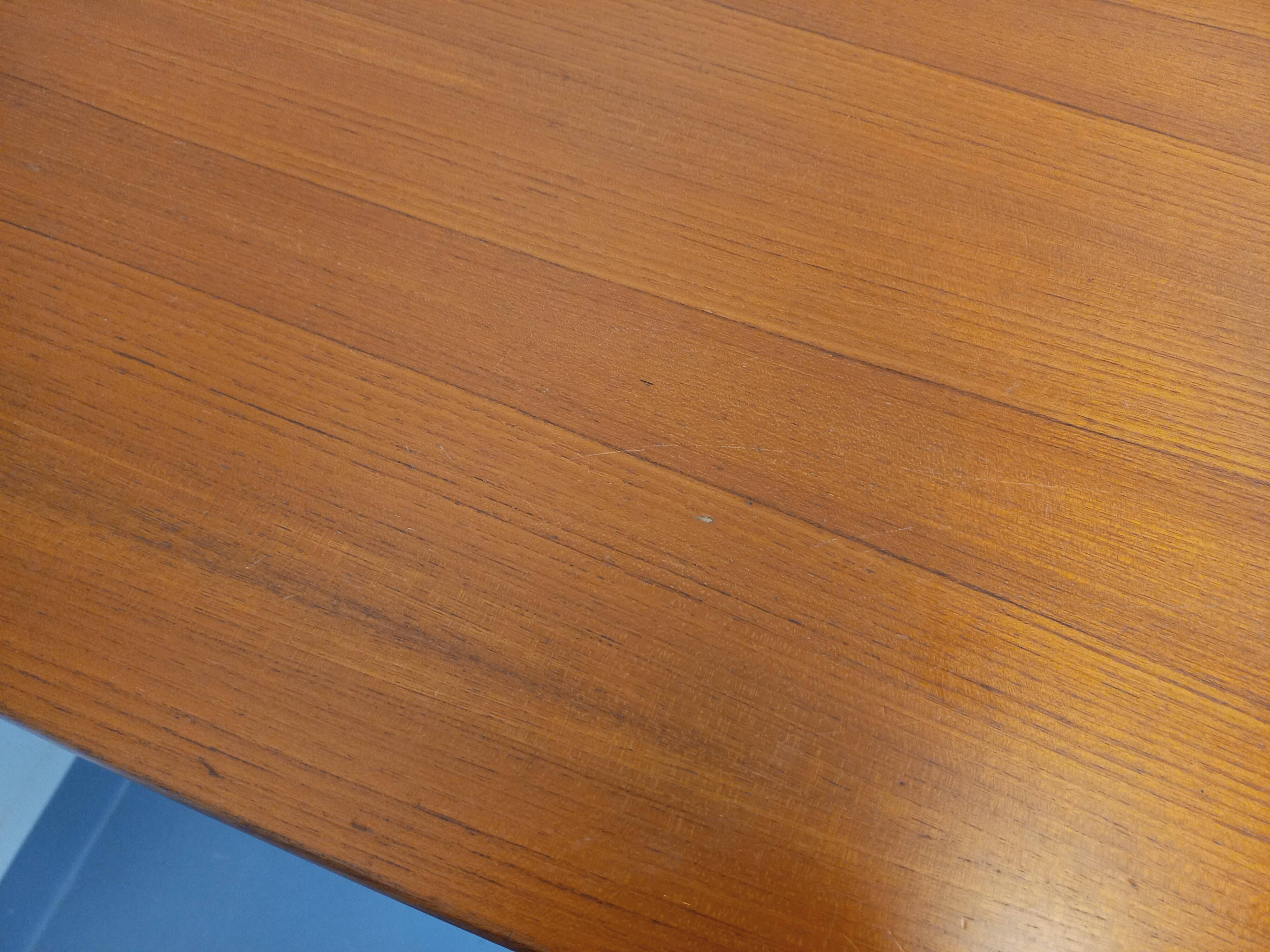 Rectangular dining table in vintage Scandinavian style from the 50s and 60s, made of teak.