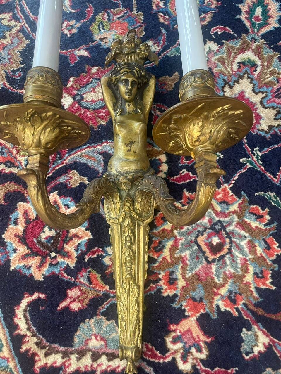 Pair of gilt bronze wall sconces with caryatid and Atlante decoration, 18th century.