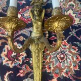 Pair of gilt bronze wall sconces with caryatid and Atlante decoration, 18th century.