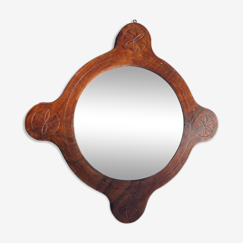 Wooden mirror with vintage rosettes