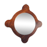 Wooden mirror with vintage rosettes