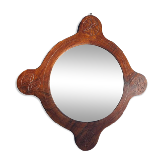 Wooden mirror with vintage rosettes