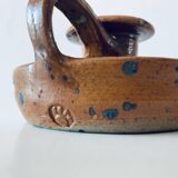 Signed sandstone candle holder
