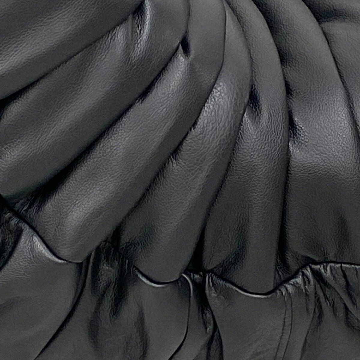 Togo chair and pouffe-black leather attributed to Ducaroy for Ligne Roset.