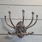 Circular chromed metal coat rack