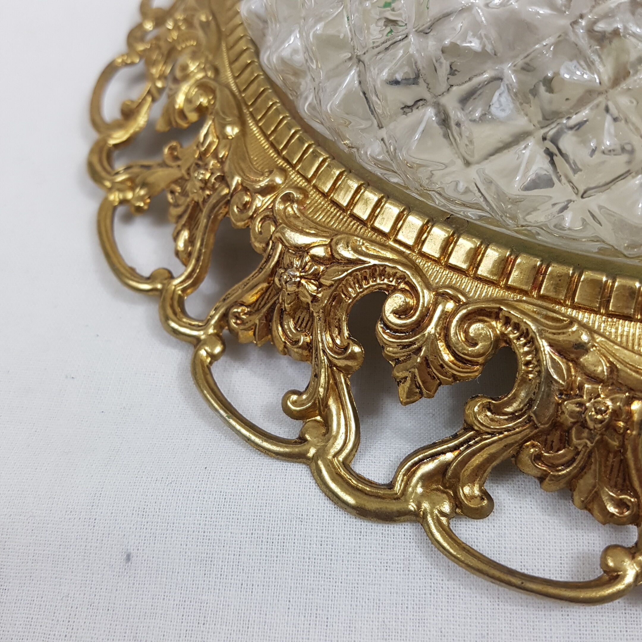 Golden mount and glass globe ceiling light