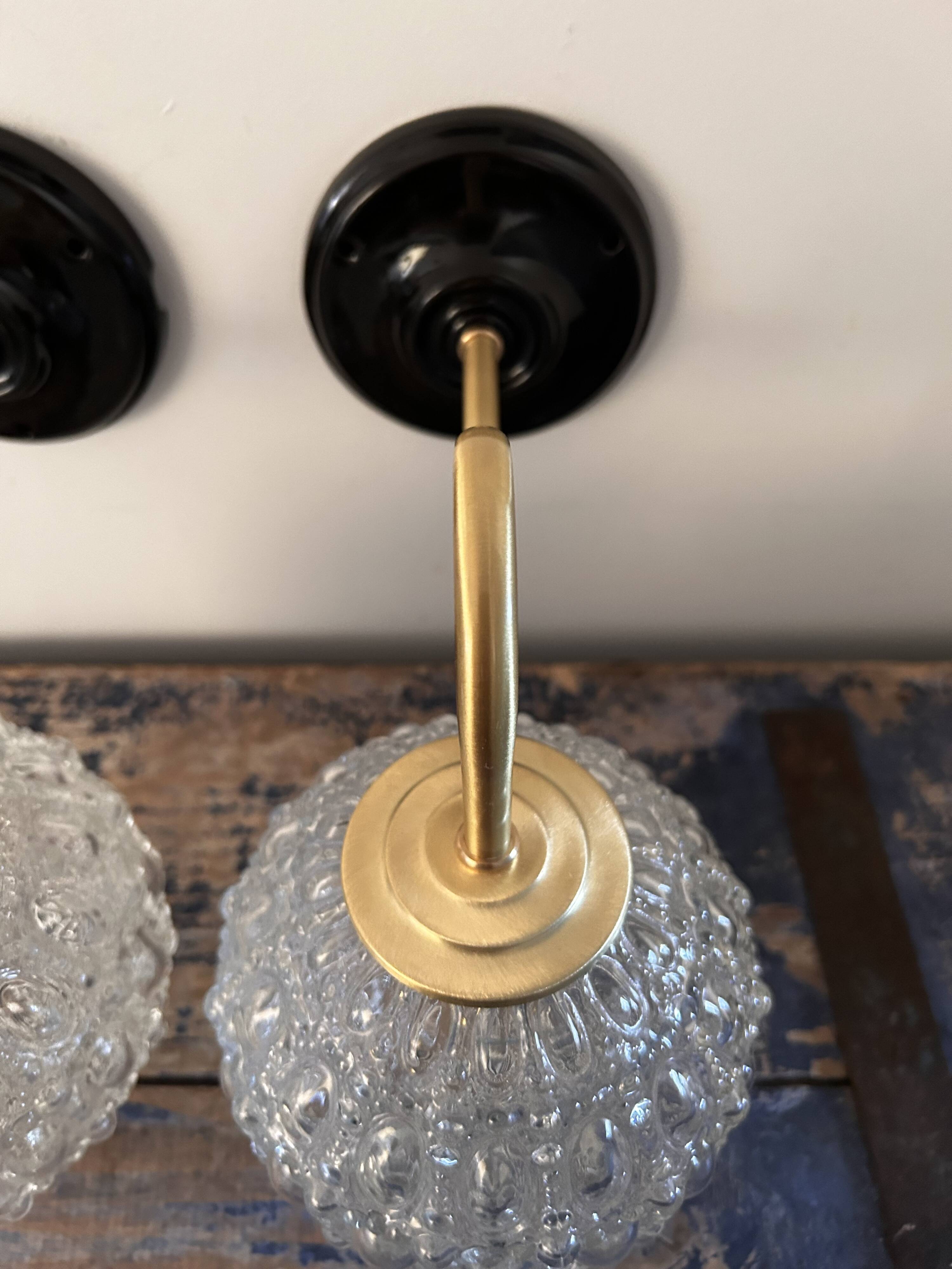 Pair of globe wall lights