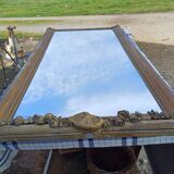19th century mirror in wood and gilded stucco "scallop shell"
