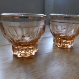 Carafe and 5 pink glass liqueur glasses with a gold rim 2008123