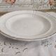 Niderviller hollow round dish in white earthenware bordered gold