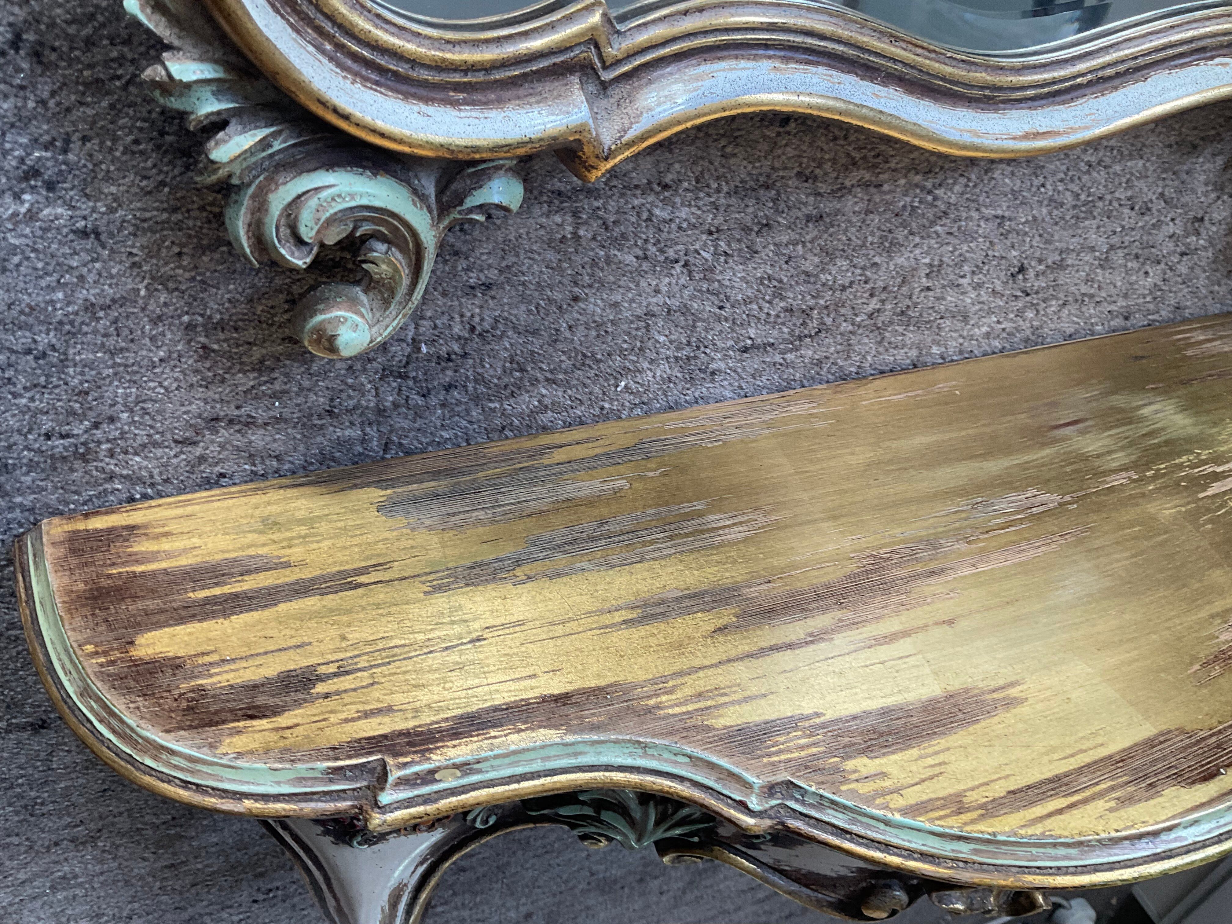 Ancien miroir et console murale en bois sculpté