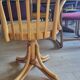 Wooden swivel armchair