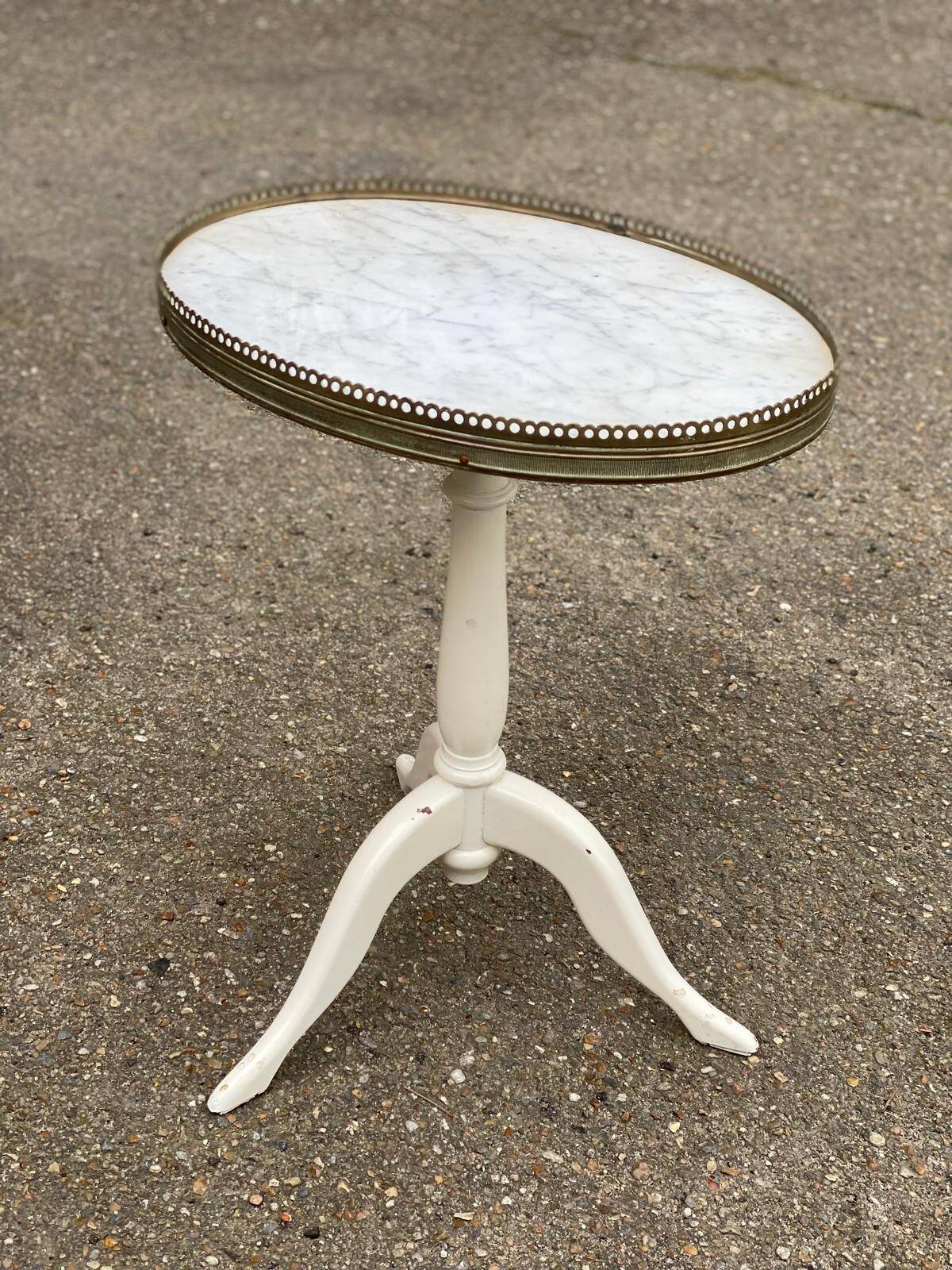 Pair of marble and ivory tripod pedestal tables