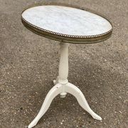 Pair of marble and ivory tripod pedestal tables